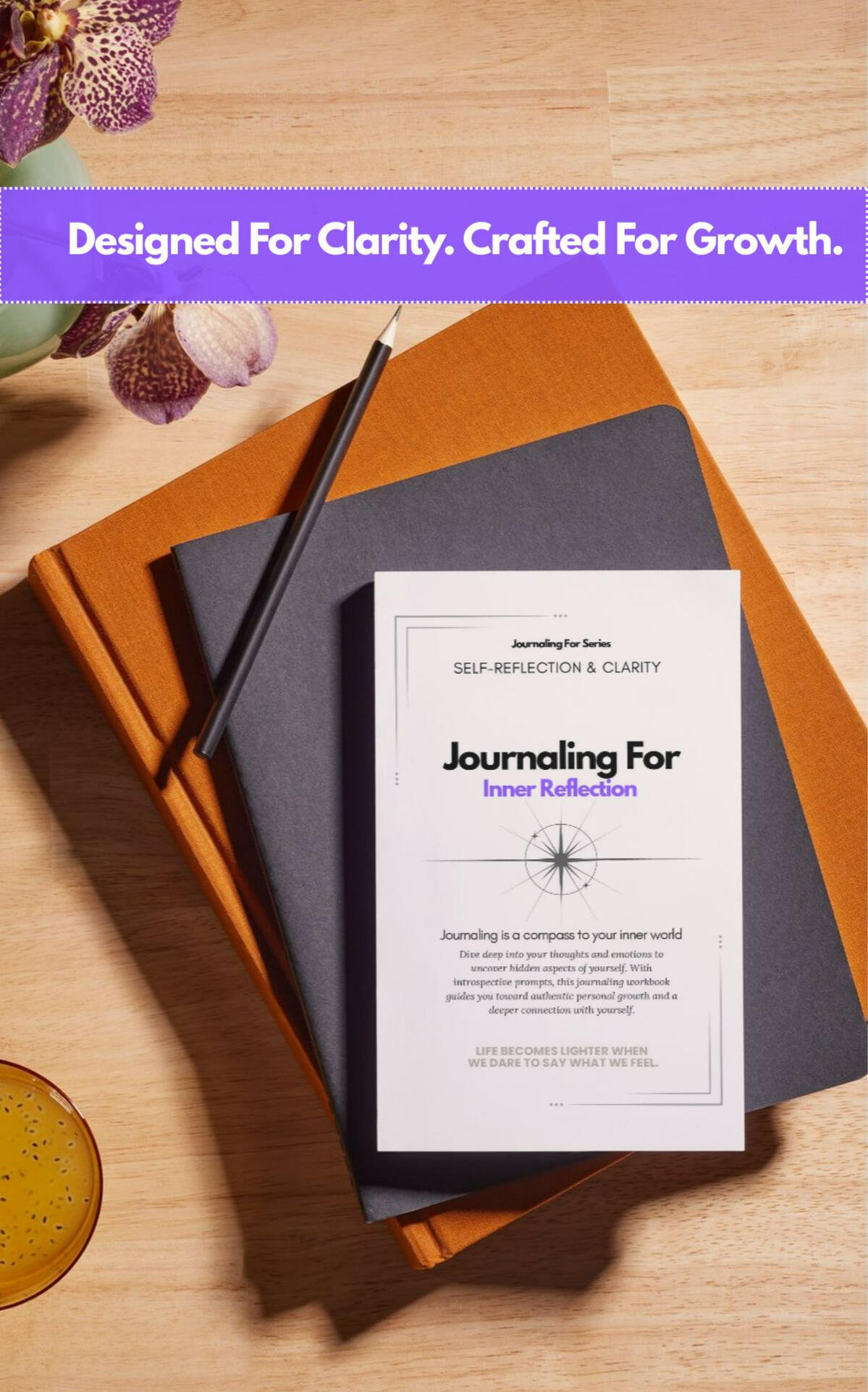Flat-lay of the ‘Journaling For – Inner Reflection’ workbook on a wooden desk with a pencil and natural elements, representing the Self-Reflection & Clarity category.